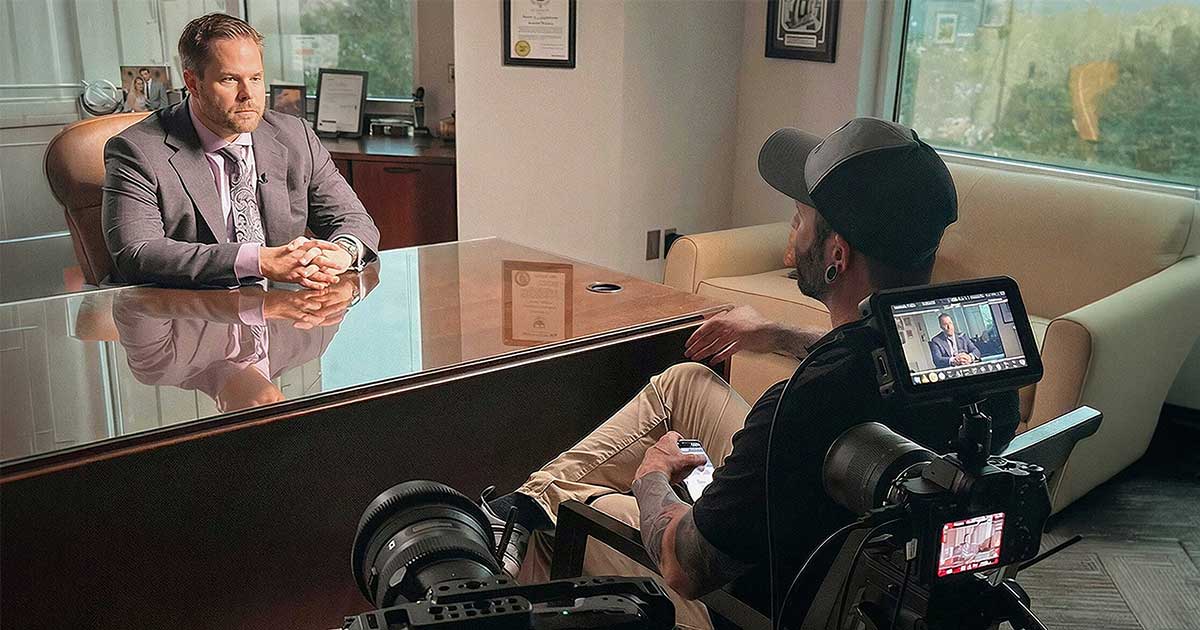 Attorney being interviewed on camera during a law firm video marketing production by Story First