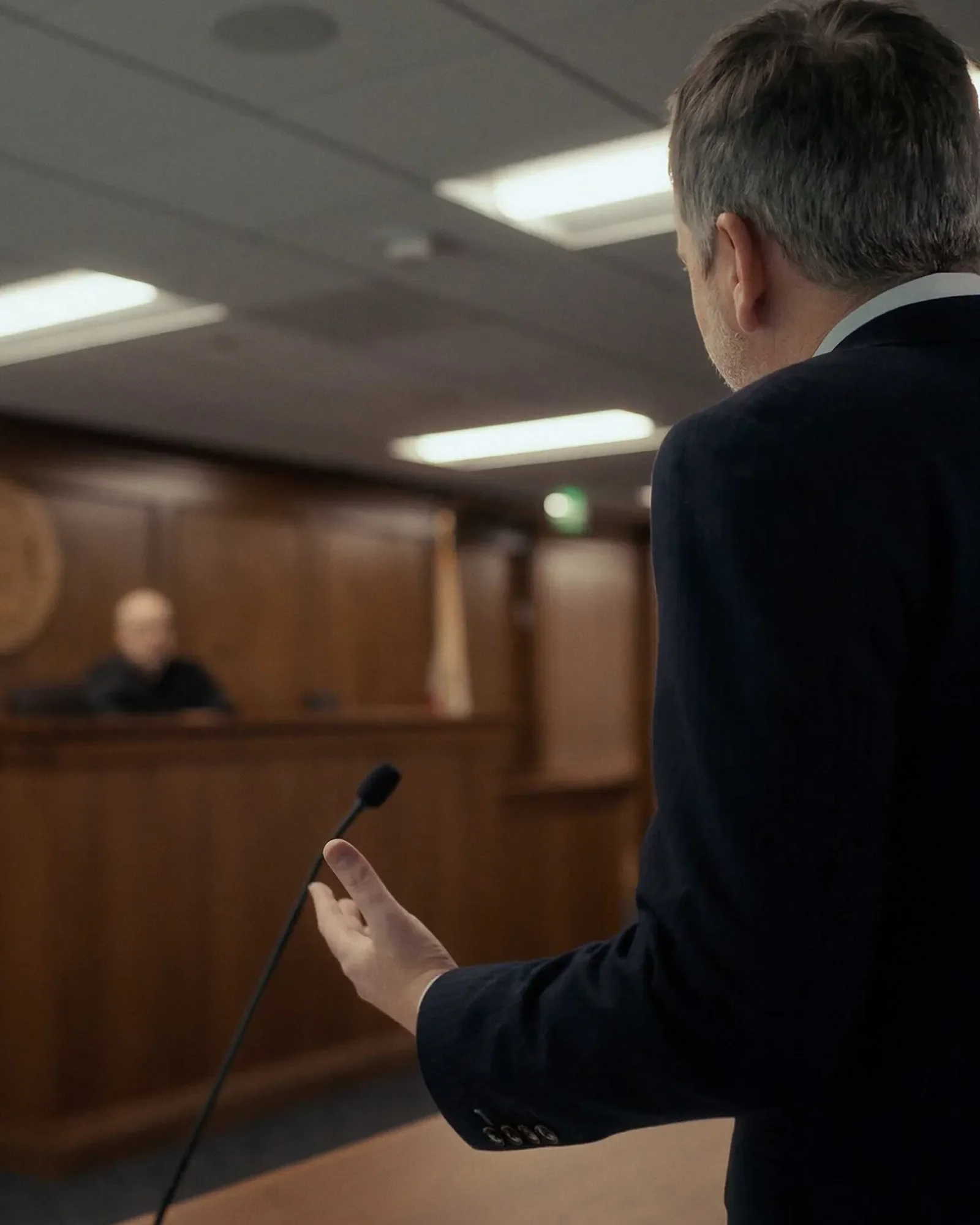 Attorney speaking in court during a practice area video scene