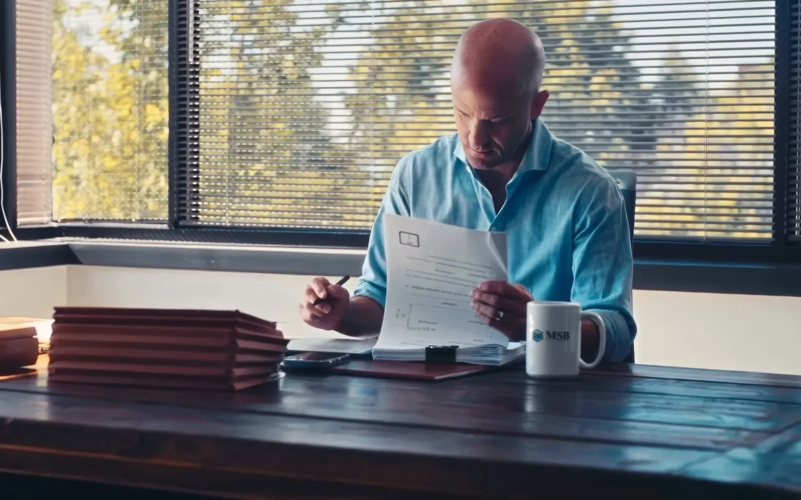 Attorney reviewing documents in a practice area video scene